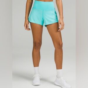 Lululemon turquoise speed up shorts, 4 inch, size 12